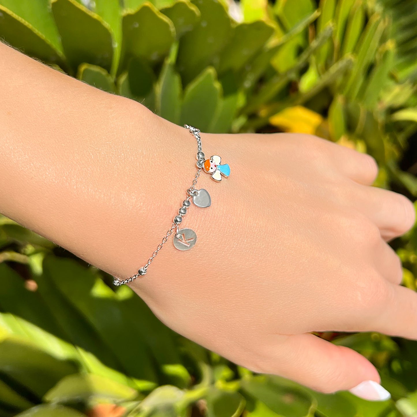 Pulsera personalizada con dije de ángel y corazón