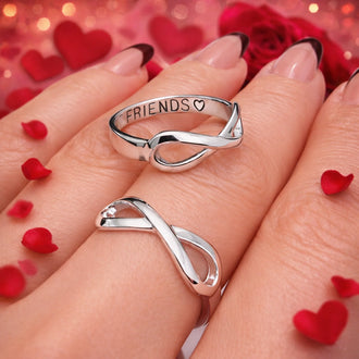 Sterling silver infinity rings on model, matching friendship promise rings close-up jewelry photo