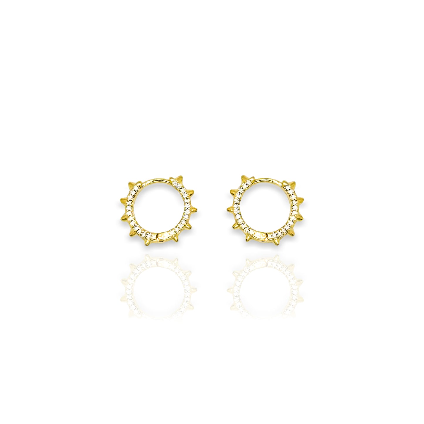 Pair of 18k gold filled circular stud earrings with spike edges and cubic zirconia accents, displayed on a clean white background with a soft reflection.