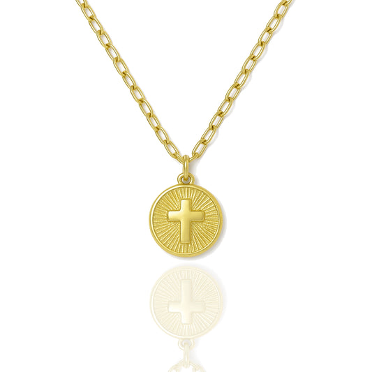 Close-up view of gold cross medallion necklace featuring a radiant sunburst pattern, hanging from a shiny 18k gold filled chain against a white background.