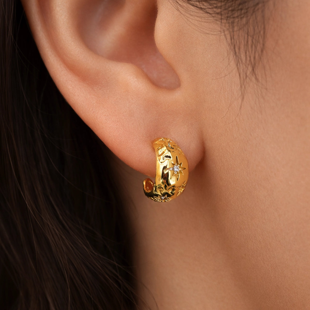 Puffed Half Moon CZ Celestial Hoop Earring in Gold – Small Polished Crescent Moon Hoop with Star Set Cubic Zirconia on Model Ear, Minimalist Celestial Jewelry, Modern Dainty Statement Earring.
