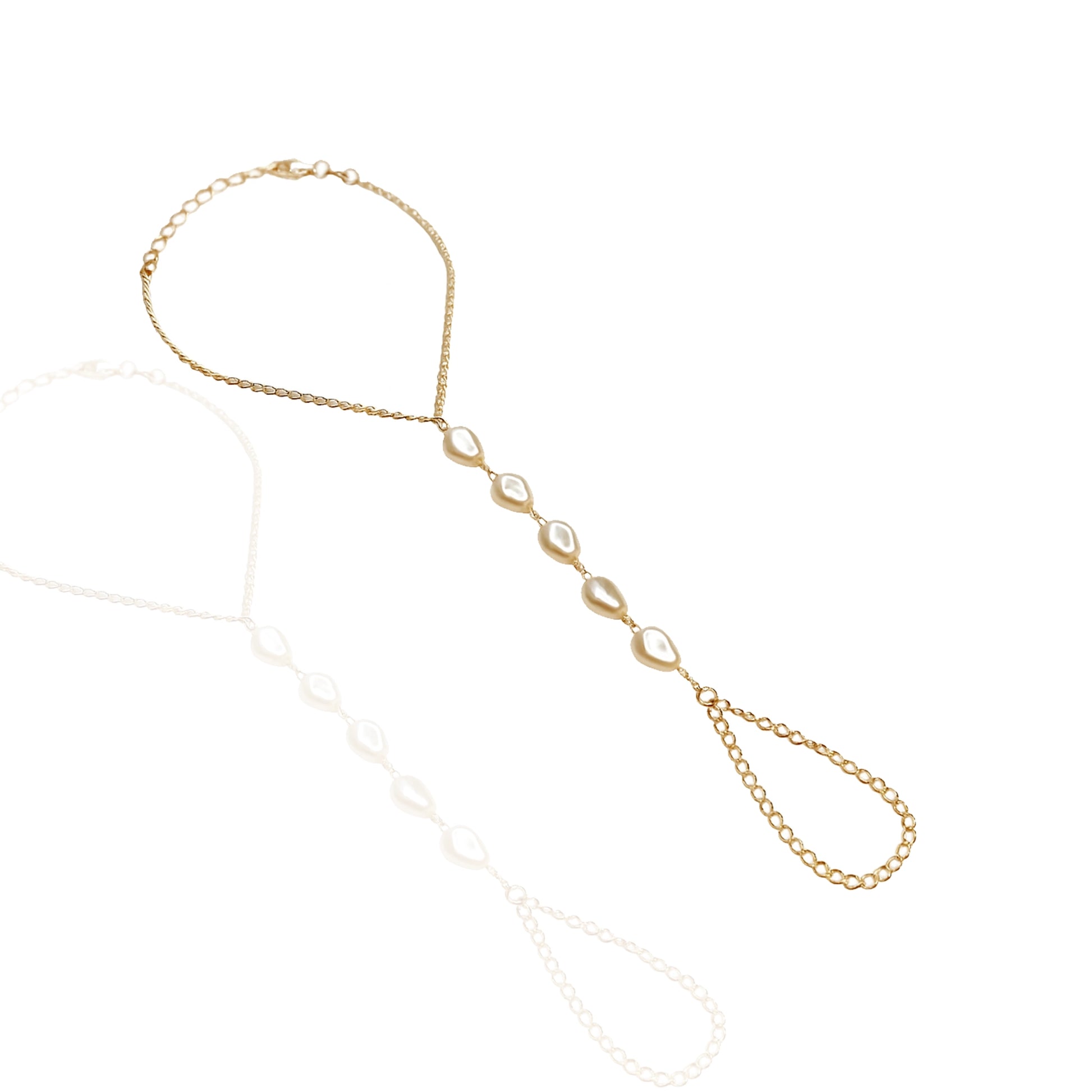 18K gold filled hand chain bracelet with imitation baroque pearls, featuring a teardrop-shaped chain loop for the finger and an adjustable lobster clasp for the wrist, shown on a white reflective background.