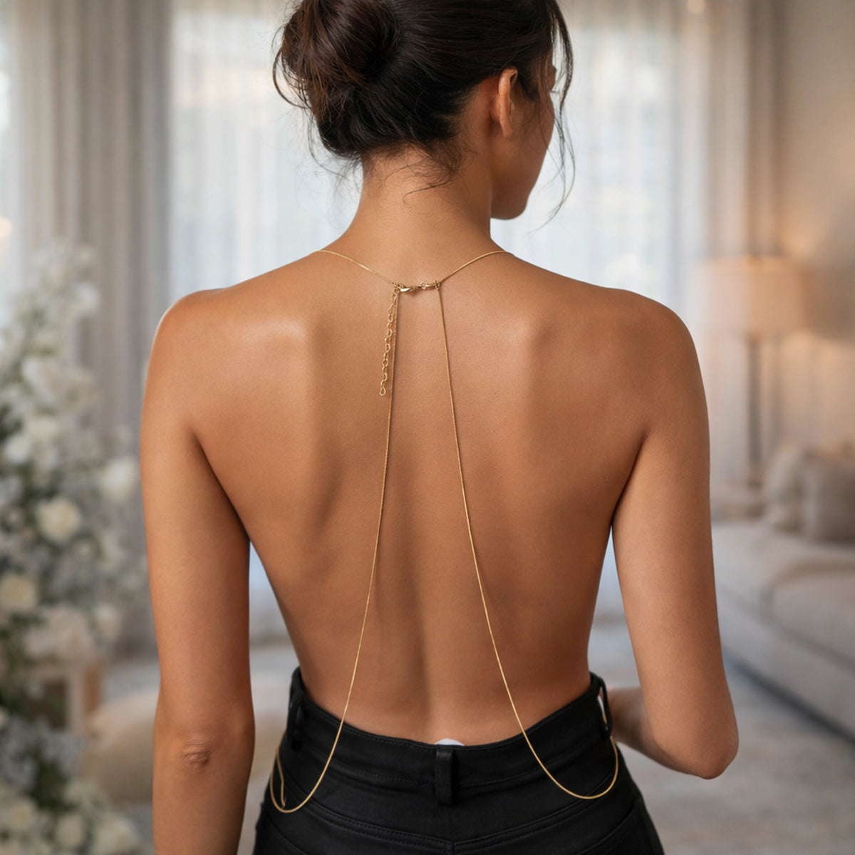 Back view of 18k gold filled CZ body chain harness necklace worn on bare back, delicate adjustable lariat body jewelry for women