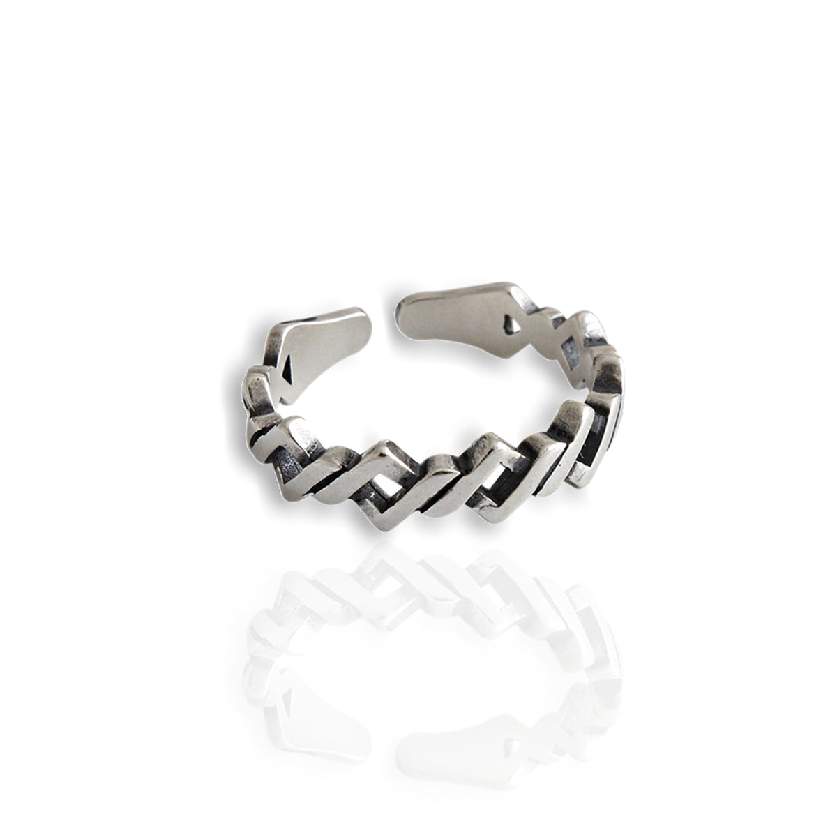 A modern Geometric Ring crafted from sterling silver with a distinctive zig zag ring design.