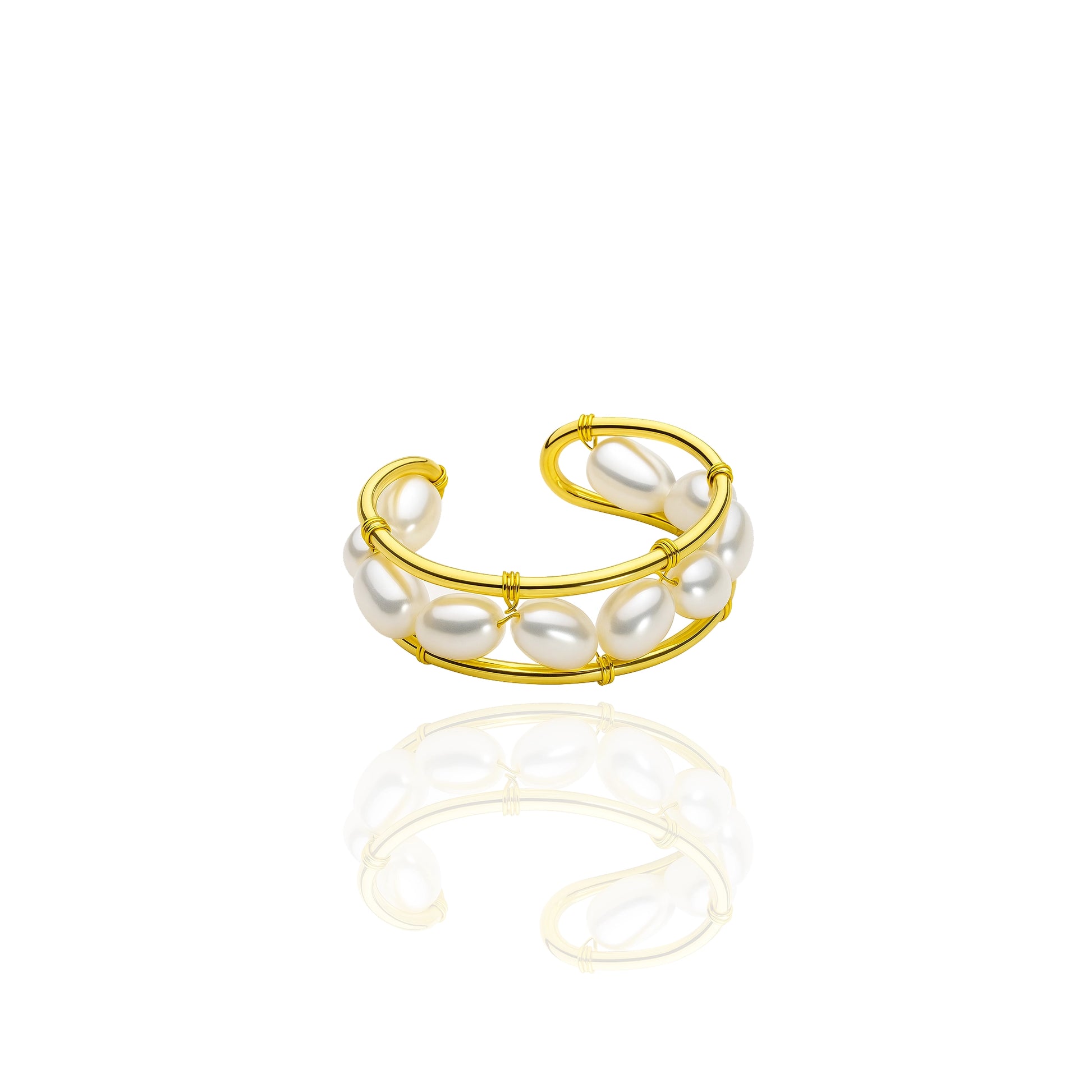 Adjustable open band ring featuring two parallel gold brass wires wrapped with oval freshwater pearls, isolated on a white background with a soft reflection.