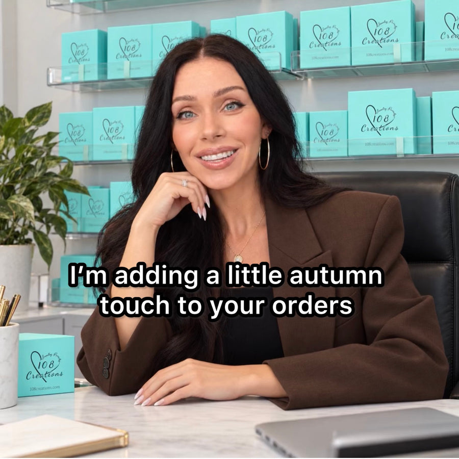 108 Creations founder in office with turquoise jewelry gift boxes