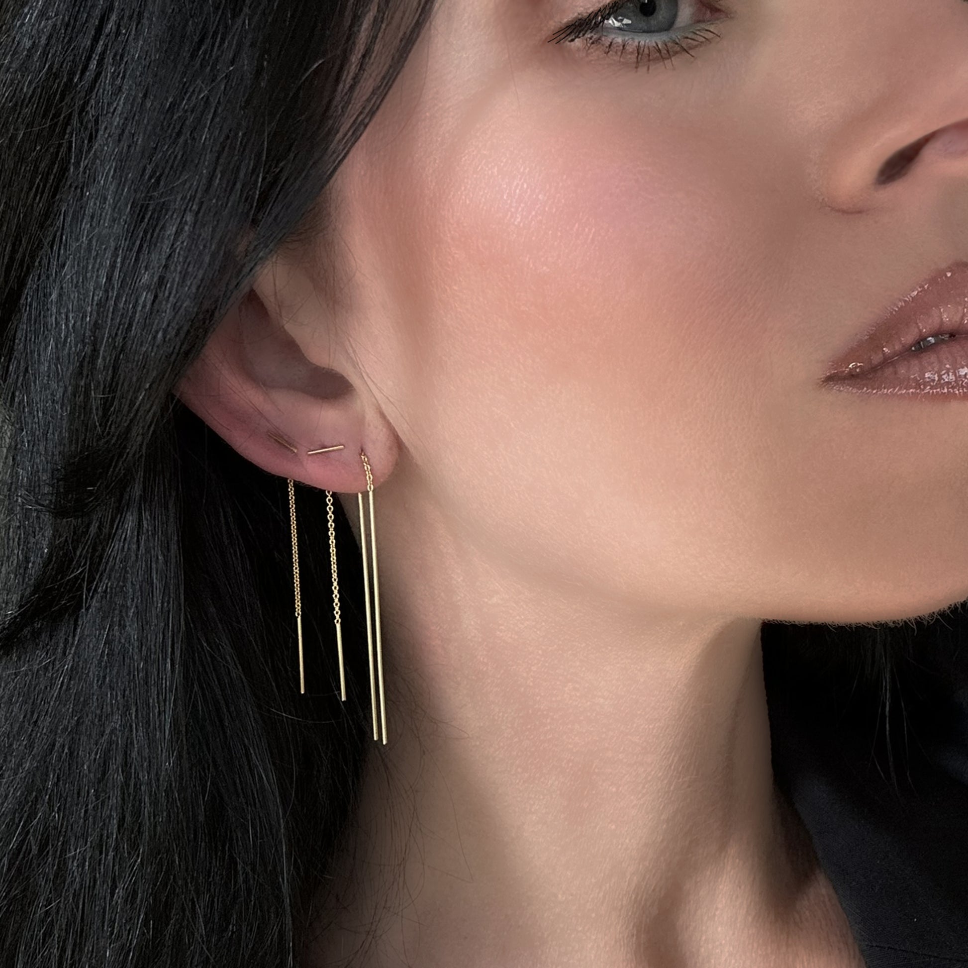 Add a touch of sophistication with our Elegant Gold Bar Threader Earrings, designed for the modern minimalist. These lightweight long-bar earrings are a trendy choice, perfect for stacking to create a unique, layered style. Their sleek and versatile design makes them ideal for everyday wear or special occasions. Handcrafted with high-quality 925 sterling silver and plated in radiant gold.
