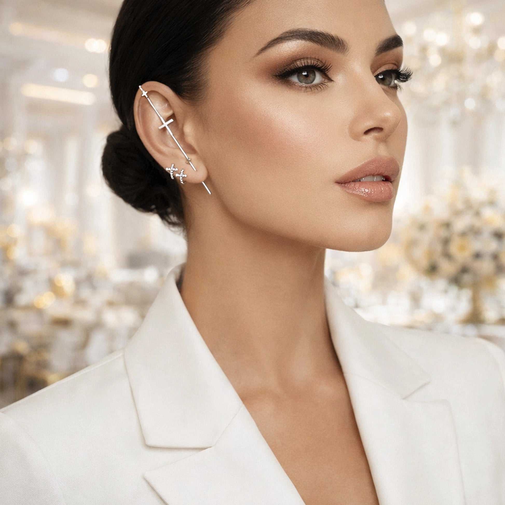 Sterling silver cross pin ear cuff and hoop earrings on elegant female model, minimalist religious jewelry with modern design, studio lighting, luxury fashion earrings for everyday wear