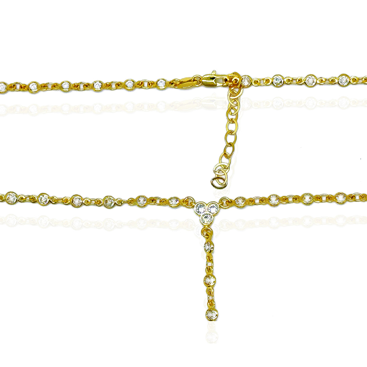 Close-up of an adjustable 18k gold-filled chain necklace with bezel-set cubic zirconia stones, showing the clasp and extender details for a perfect fit.
