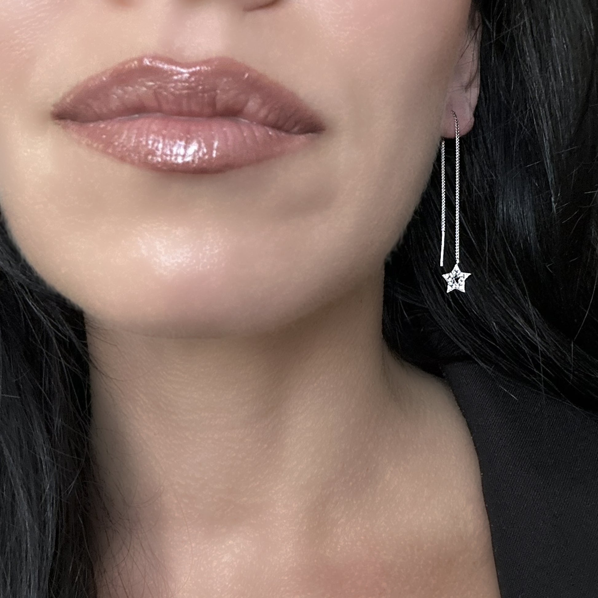 Illuminate your style with these celestial-inspired threader earrings, adorned with a dazzling star charm. The adjustable length offers versatile wear, making them perfect for stacking and layering with other pieces. Their lightweight and minimalist design ensures comfort, ideal for sleeping or everyday elegance. Handcrafted with high-quality 925 sterling silver.