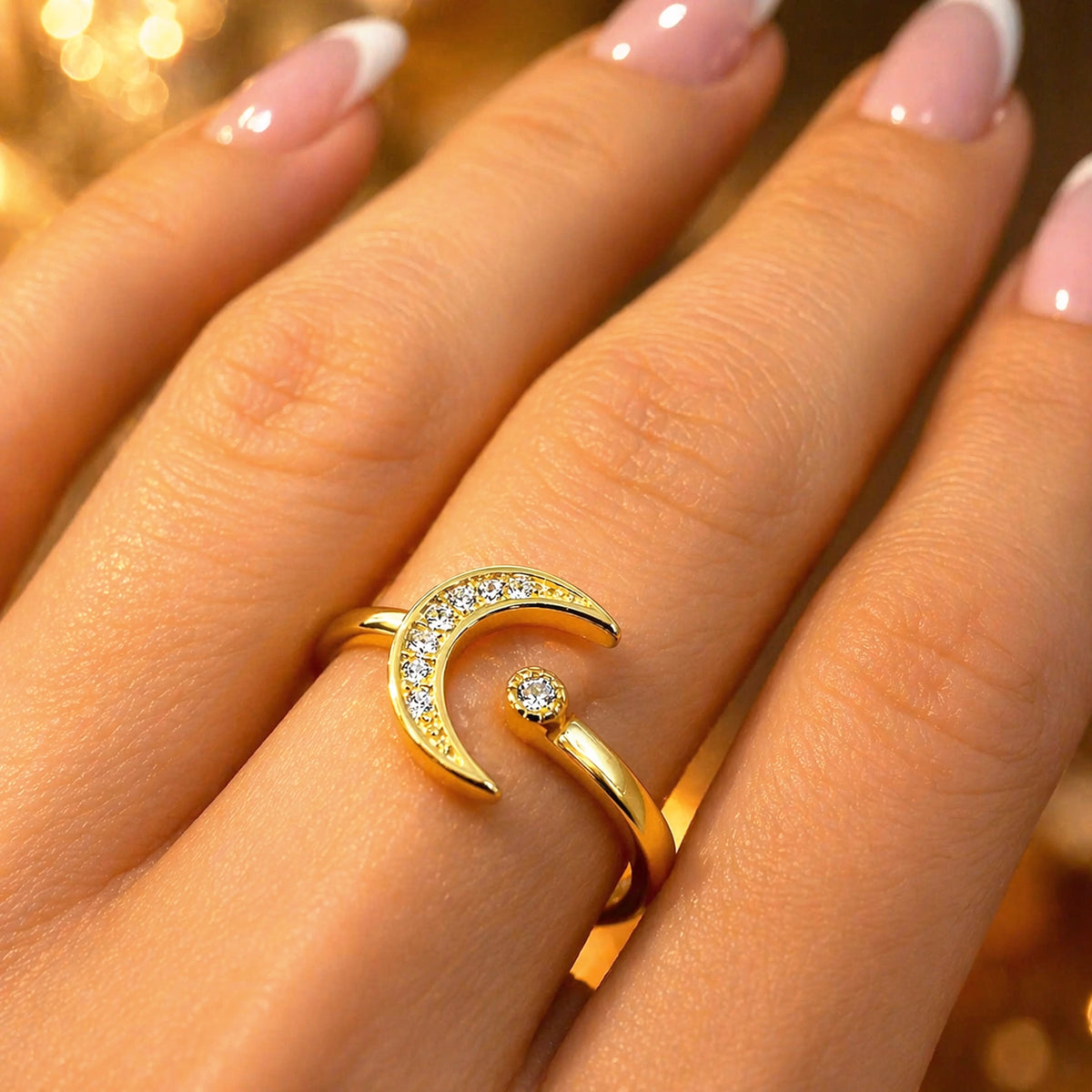 crescent moon cz ring gold plated sterling silver open adjustable dainty ring on finger close up