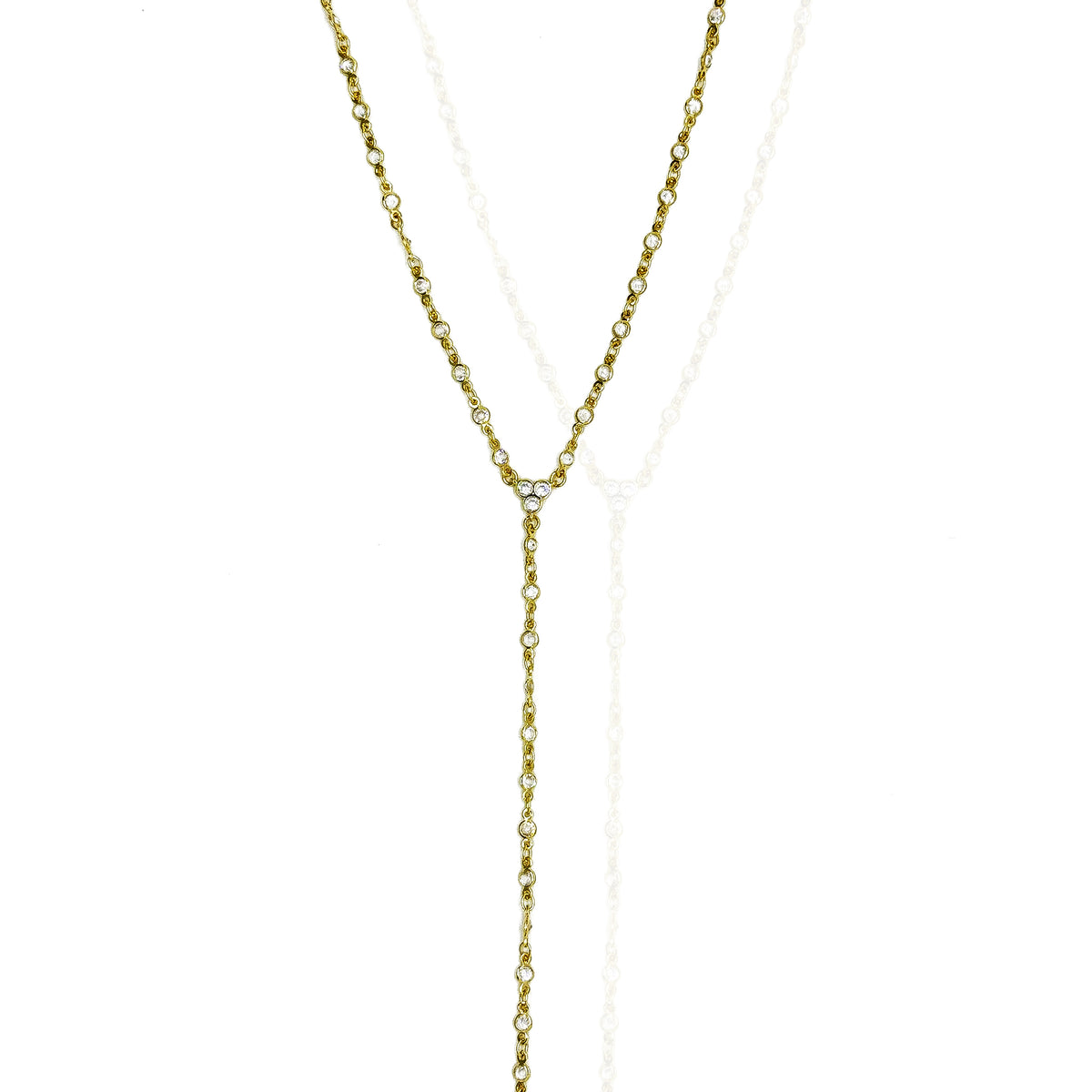 Gold-filled non-tarnish lariat necklace with a long drop adorned with round bezel-set cubic zirconia stones, arranged in a delicate Y-shape on a white background.