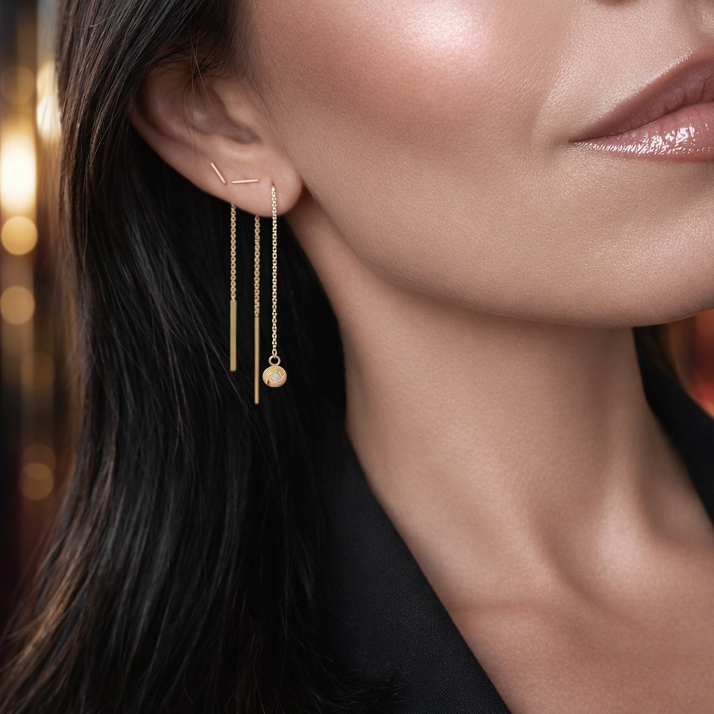 Elegantes pendientes de barra de oro con enhebrador