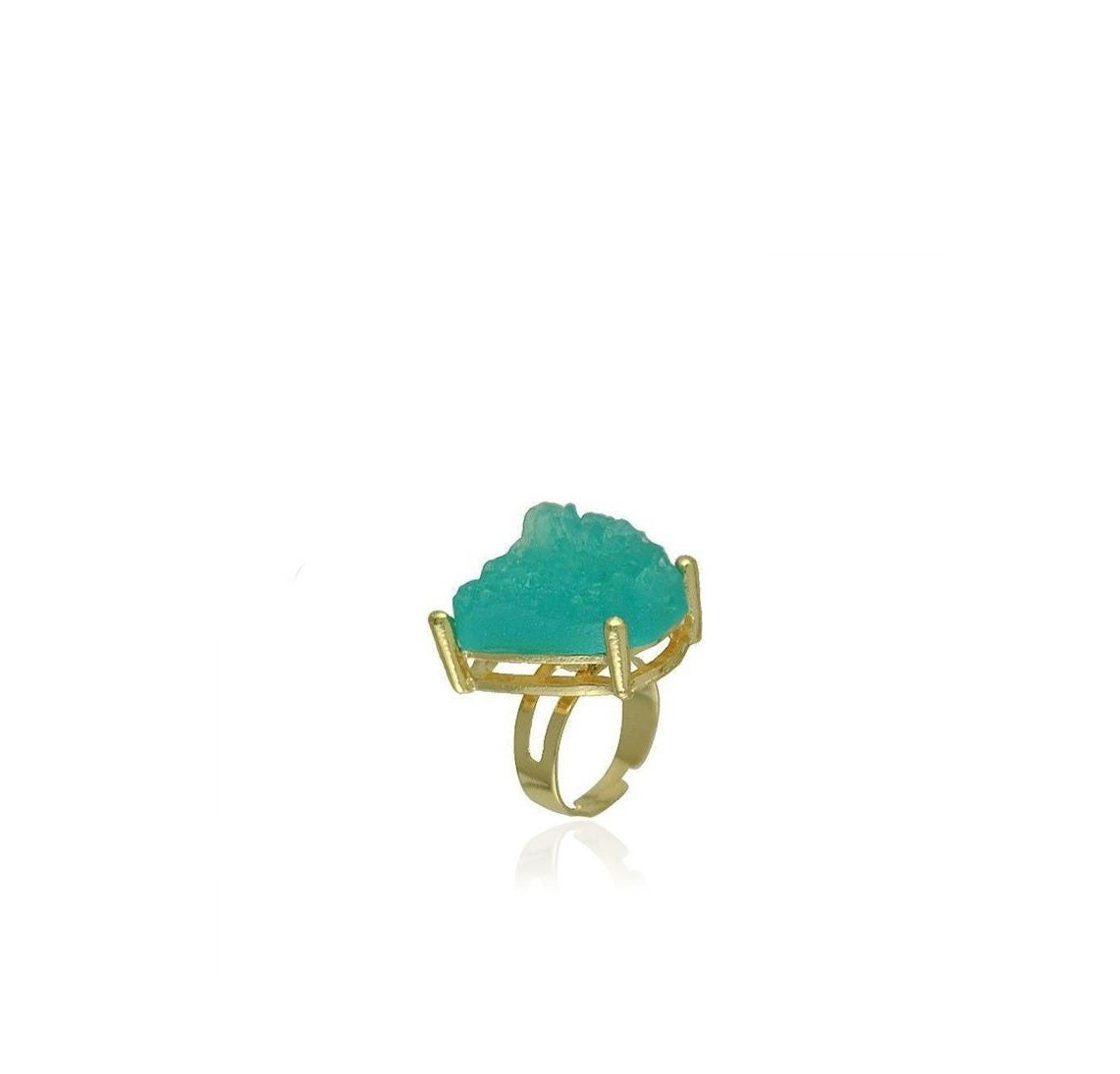 adjustable brass ring with a large, irregular-shaped green raw crystal stone set in the center.