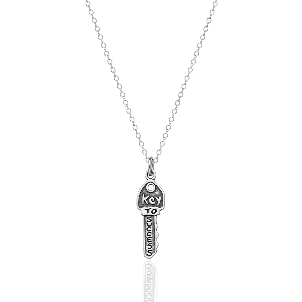 Minimalist sterling silver key to success necklace with oxidized 3D success charm on a dainty rhodium plated chain