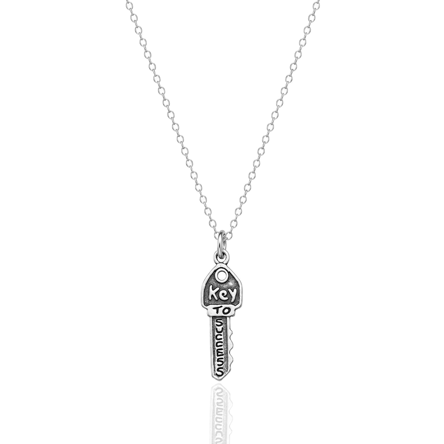 Minimalist sterling silver key to success necklace with oxidized 3D success charm on a dainty rhodium plated chain