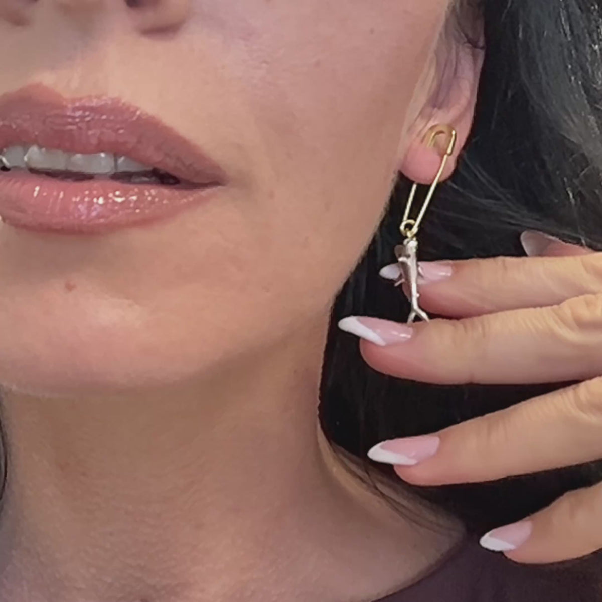 Dangle shark safety pin earring in sterling silver, shown up close to highlight its unique and edgy design