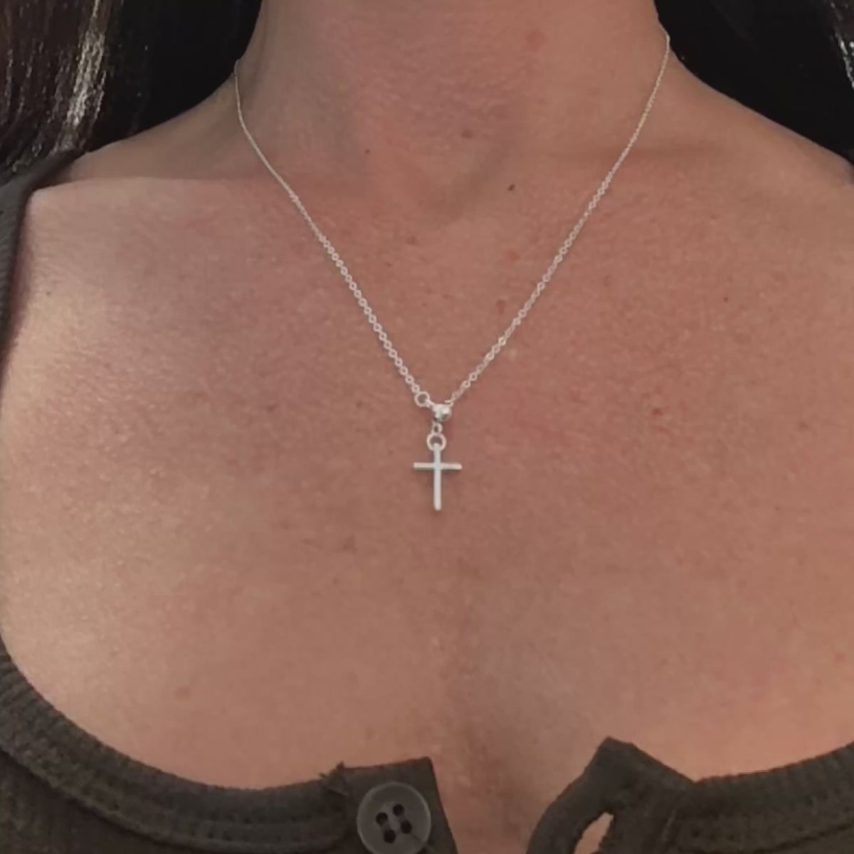 Sterling silver lariat cross necklace video showcasing the elegant Y-shaped design with a minimalist cross charm, perfect for layering or wearing solo