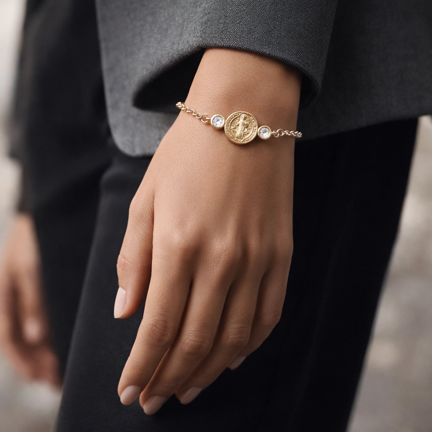 Gold filled Virgin Mary coin bracelet with CZ stones on a woman’s wrist, delicate religious charm bracelet, minimalist luxury jewelry on model hand