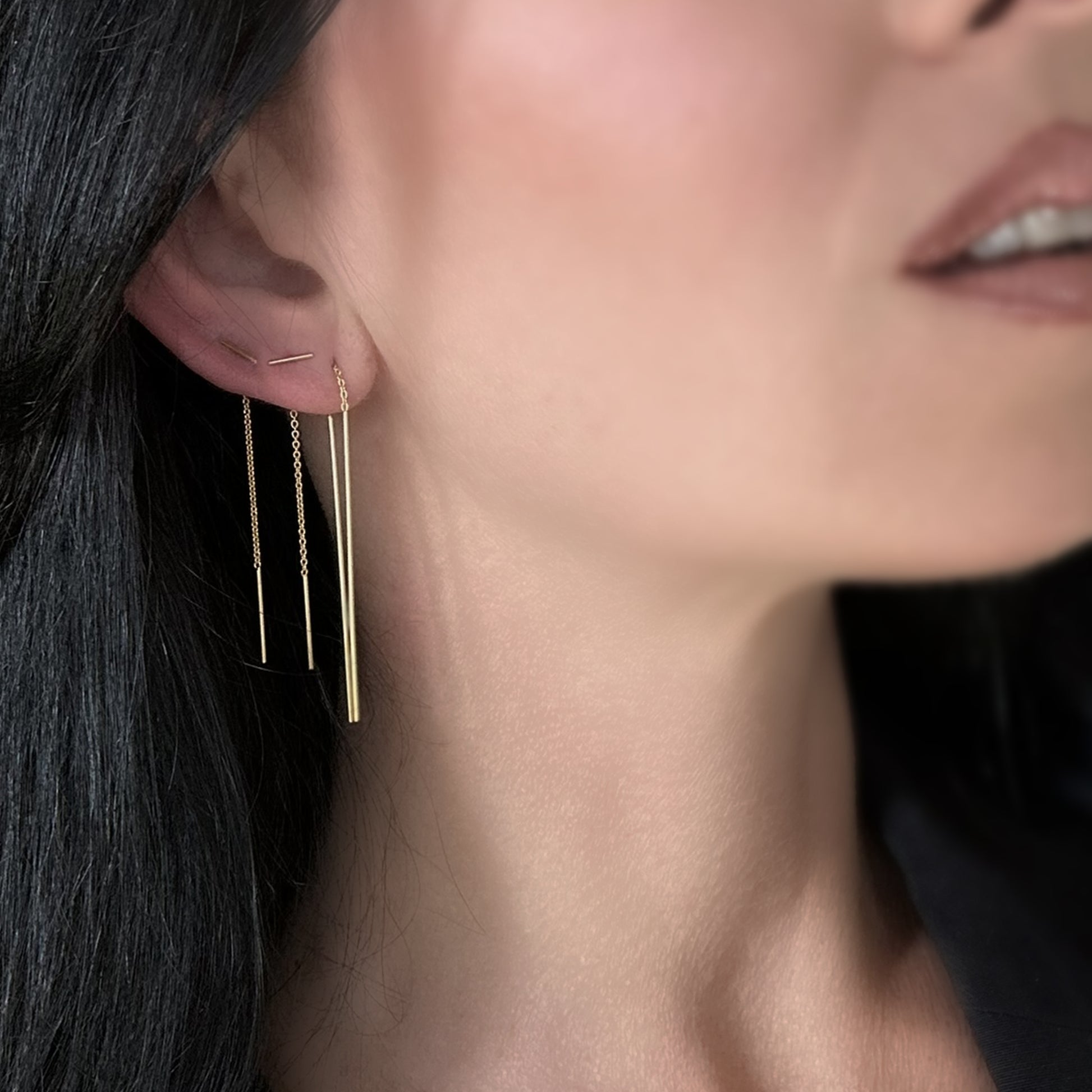 Add a touch of sophistication with our Elegant Gold Bar Threader Earrings, designed for the modern minimalist. These lightweight long-bar earrings are a trendy choice, perfect for stacking to create a unique, layered style. Their sleek and versatile design makes them ideal for everyday wear or special occasions. Handcrafted with high-quality 925 sterling silver and plated in radiant gold.