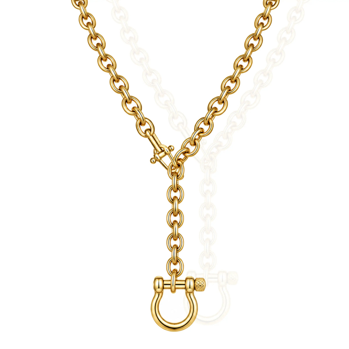 Chunky gold lariat necklace with bold cable links, Y-shaped drop, horseshoe shackle pendant and push-button clasp on white background.