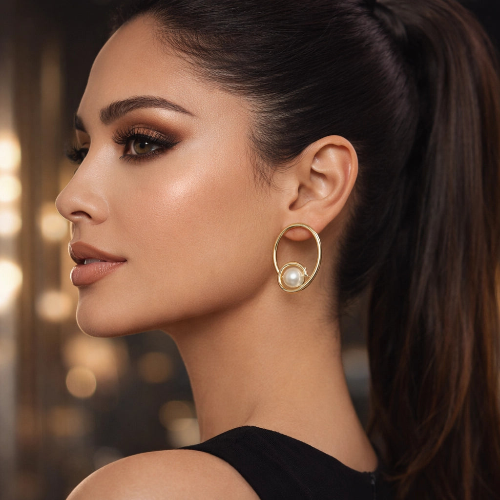 a brunet model with ponytail wearing  Gold Hoop Earrings with White Pearl • Wire Hoop Brass Earrings • Spiral Chick Earrings for Her