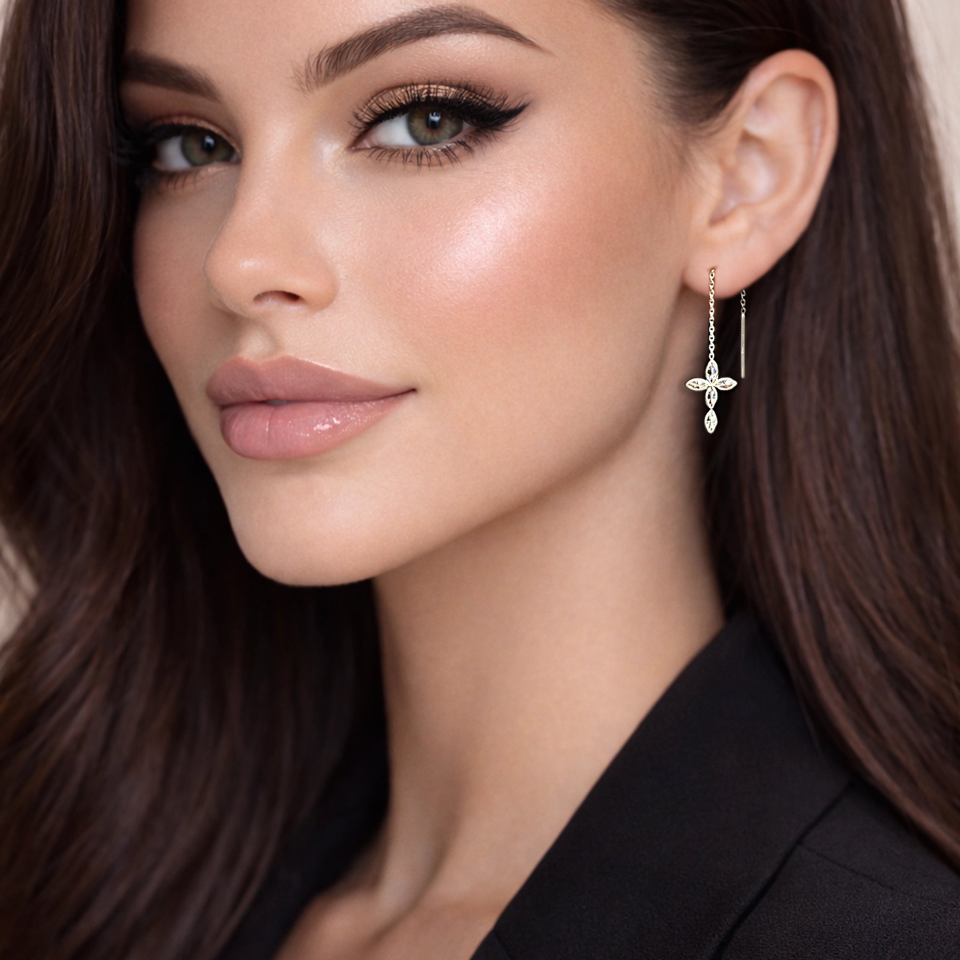 Model wearing sterling silver threader earrings with cubic zirconia cross charm and bar end chain.