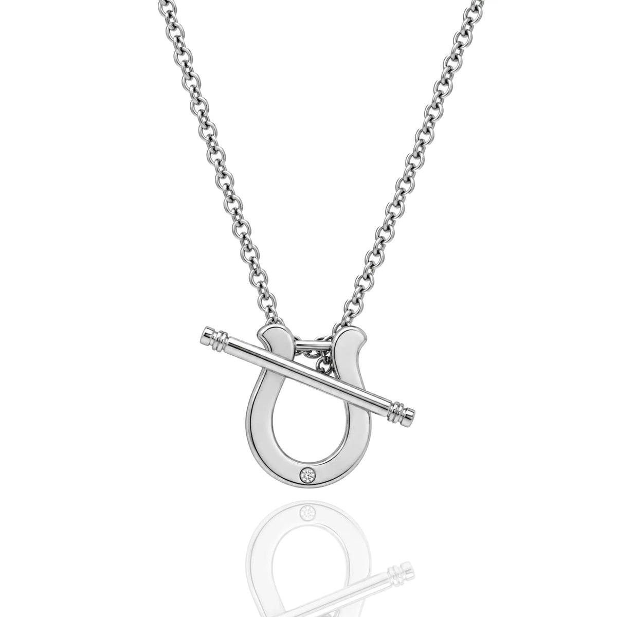 925 sterling silver horseshoe toggle necklace with rhodium plating, small CZ stone and 16 inch silver chain on a white background.